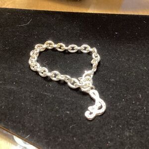 Silvertone Link Bracelet with Symbol Charm